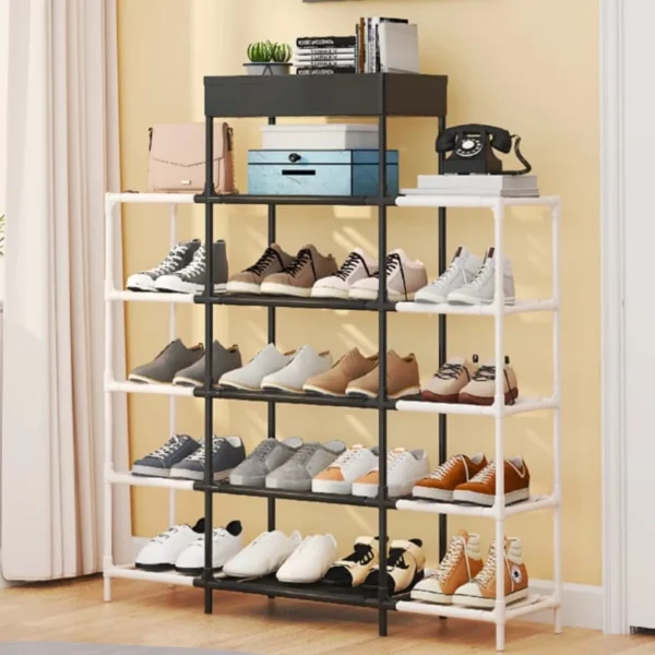 Black and white five-layer open metal shoe rack filled with shoes and trainers