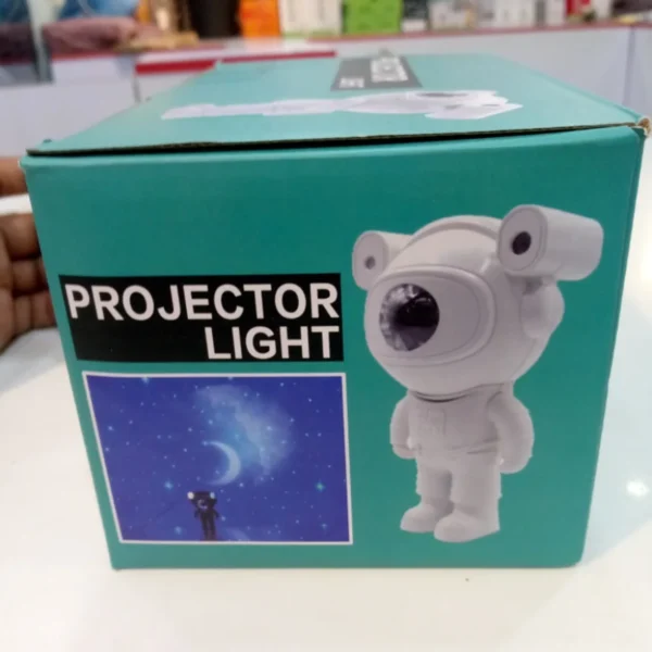 Astronaut Projector Light box showing a star and moon projection