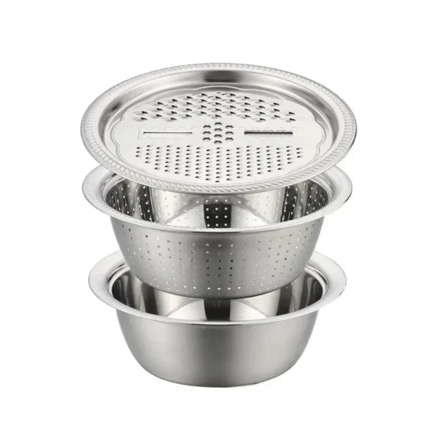 Stacked stainless steel grater lid, colander and mixing bowl on white background