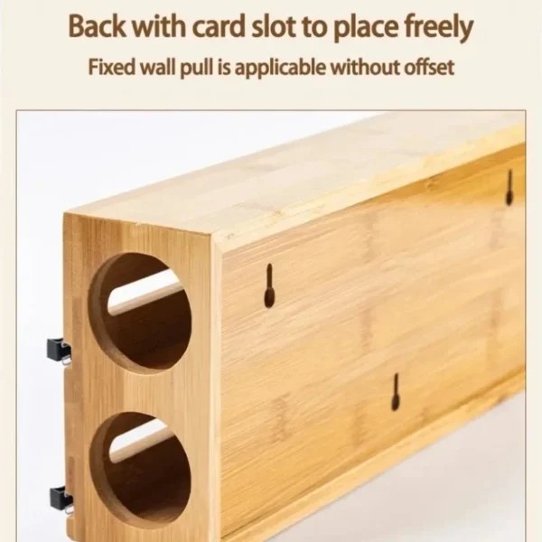 Back of the bamboo wrap dispenser showing the card slot and wall-mount holes