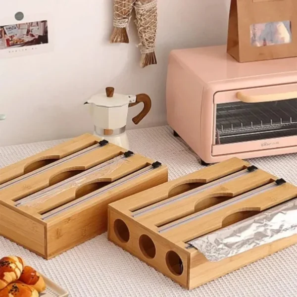 Single-layer and multi-layer bamboo wrap dispensers with cutters on a kitchen table