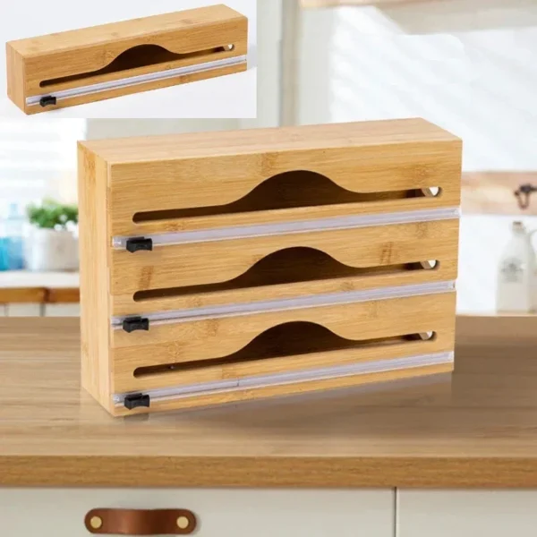 Three-layer bamboo wrap dispenser with slider cutters on a kitchen shelf