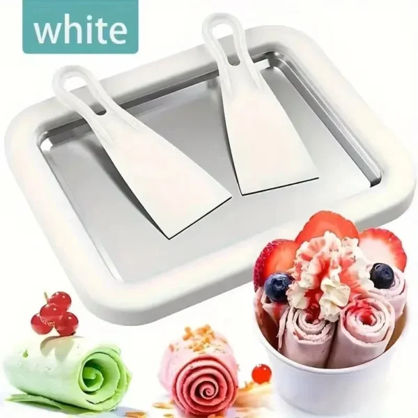White ice cream plate with two white spades and rolled ice cream with strawberries