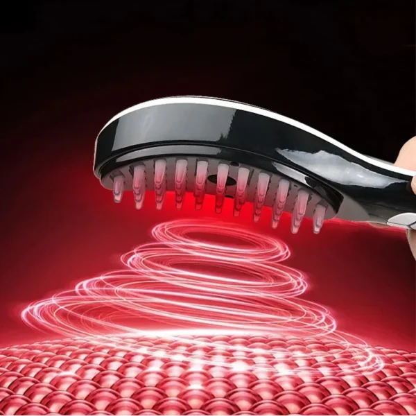 Electric scalp massage comb with a red light glowing over its massage nodes