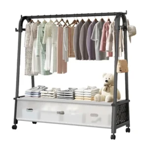 Black-frame clothes rack on wheels with hanging clothes and white lower storage