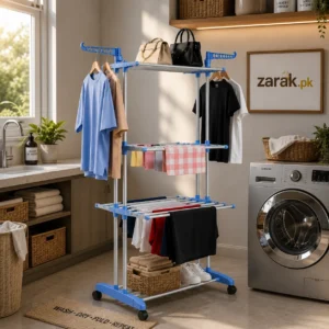 Blue and white three-tier folding clothes drying rack with clothes and towels in a laundry room