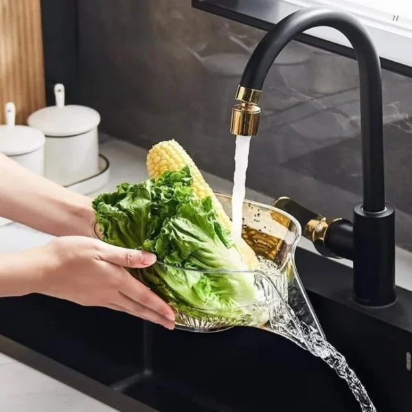 Hands washing lettuce and corn in the basket under a running tap