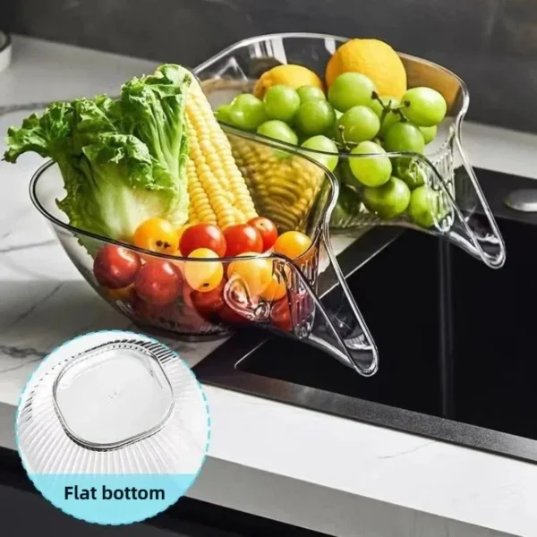 Washing basket filled with vegetables and fruit on a sink, with flat bottom shown