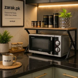 Black metal stand with wood-grain top over a microwave oven on a kitchen counter