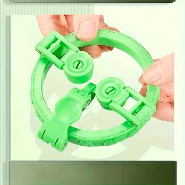 Hands holding the green rotating apple peeler ring and adjusting its sliding position