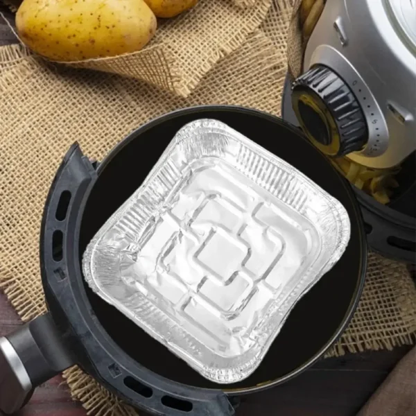 Square foil plate placed in an air fryer basket
