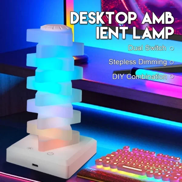 Stacked RGB lamp glowing blue and pink on a desk beside a keyboard, with desktop lamp text