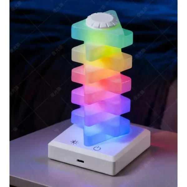 Stacked cube lamp showing rainbow colour bands on its white base
