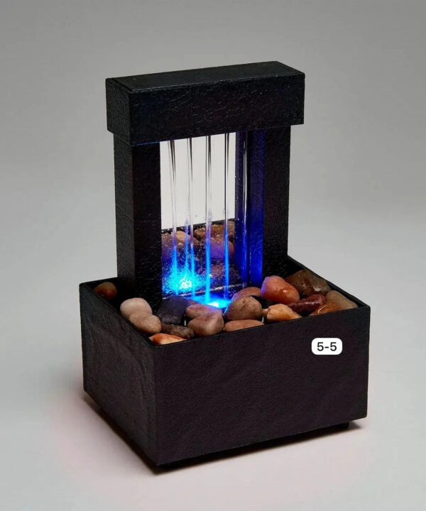 Tabletop LED water fountain with pebbles and blue lighting