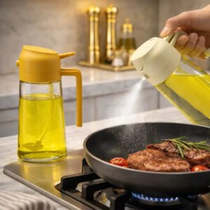 2-in-1 leakproof oil and vinegar dispenser bottle in use on a stove